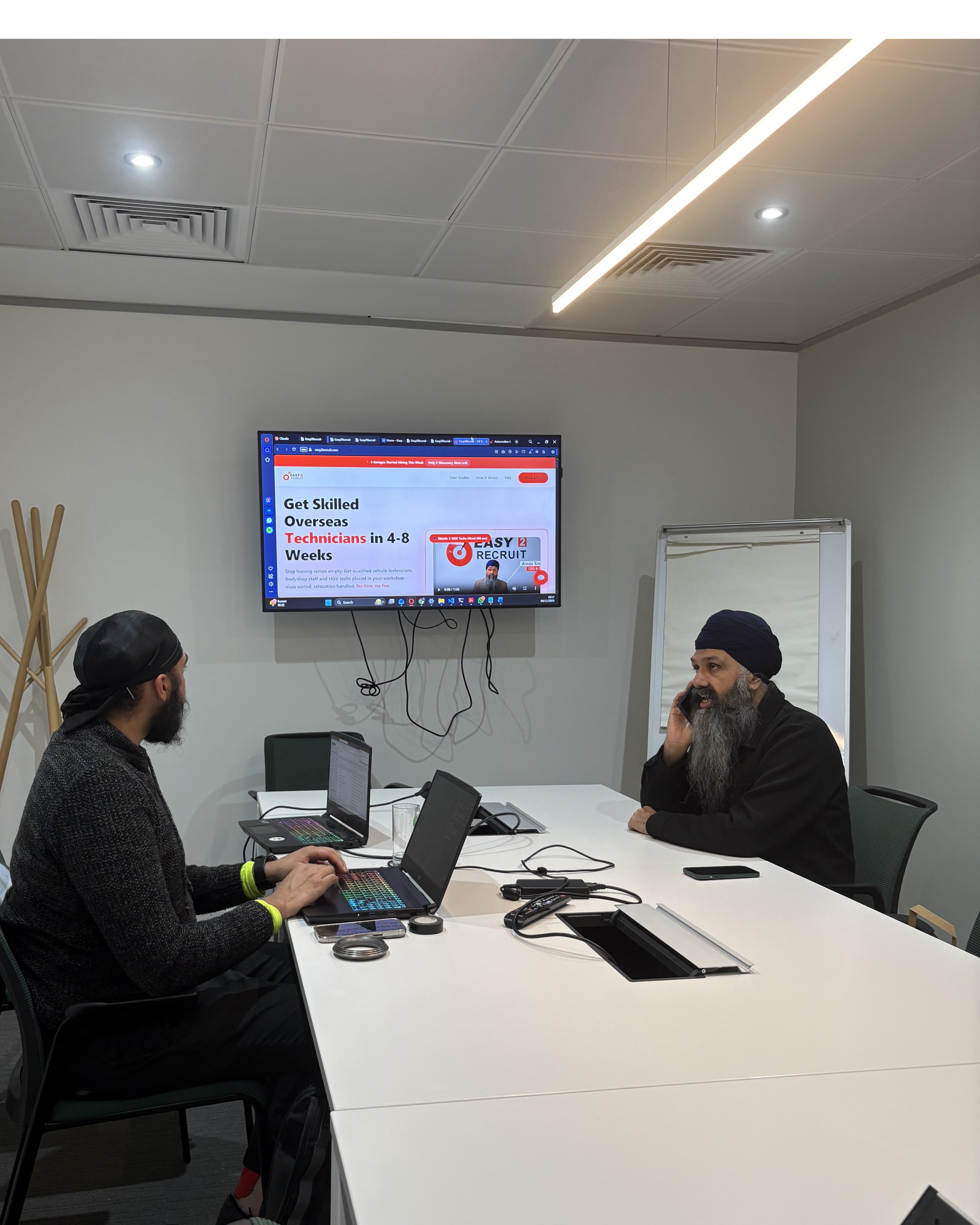 Merlins Group walking a client through their site and ads